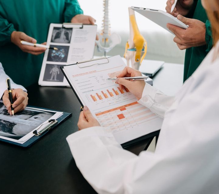 medical-team-having-a-meeting-with-doctors-in-whit-2024-01-05-20-47-20-utc